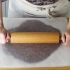 Roll out the mixture between 2 pieces of wax paper down to 1/2-cm thickness