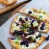 Blueberry, feta and honey caramelized onion naan pizza