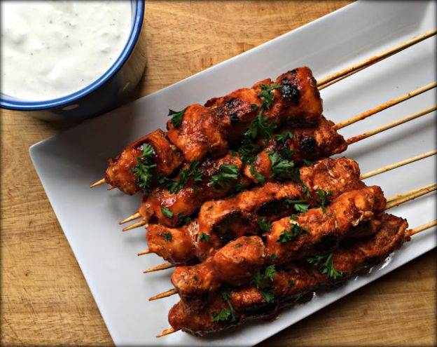 Buffalo chicken bite skewers with blue cheese yogurt dip