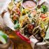Bulgogi BBQ Pork Tacos with Charred Tomatillo Sesame Sauce and Spring Onion Slaw