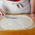 Spread the cream cheese over the whole sheet of puff pastry