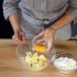 Pour in the egg yolks