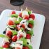 Caprese skewers with balsamic reduction drizzle