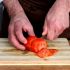 Slice the tomatoes