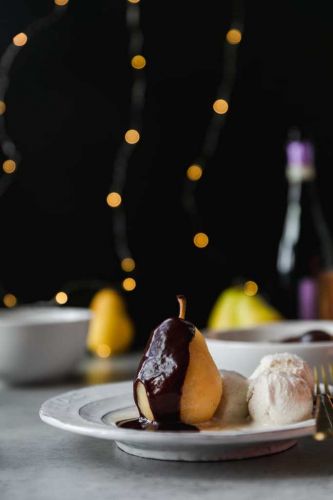 Champagne Poached Pears with Dark Chocolate Fudge Sauce