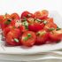 29. Halve cherry tomatoes the easy way