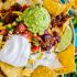 Ultimate Chili Nachos with Queso and Guacamole