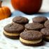 Chocolate sandwich cookies with pumpkin spice buttercream