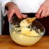 Pour the dough into a bowl and add the eggs
