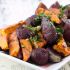 Spicy roasted sweet potatoes with strawberries