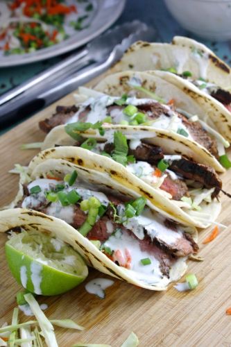 FLANK STEAK TACOS WITH CILANTRO LIME YOGURT SAUCE