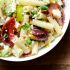 Smoky heirloom tomato and grilled peach pasta salad with basil vinaigrette