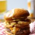 Juicy Ball Park Burger with Onion Rings and Mustard Beer Sauce