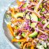 Loaded sweet potato fries with BBQ jackfruit and red cabbage apple slaw