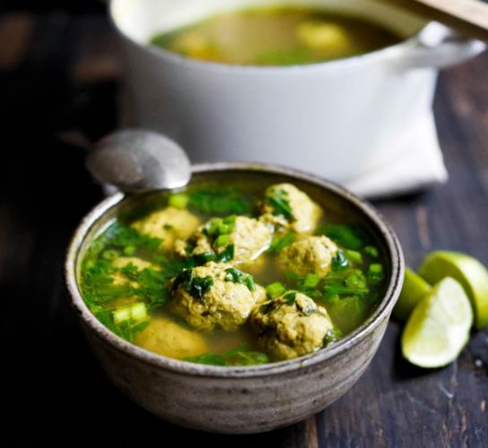 Arabic meatball soup with spinach and lime