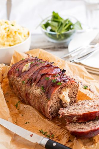 Mozzarella-stuffed bacon-wrapped meatloaf