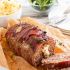 Mozzarella-stuffed bacon-wrapped meatloaf
