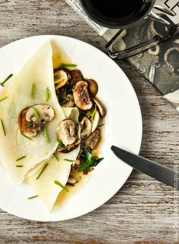 Savory crepes with sauteed mushrooms and scallions