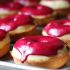 Baked nutmeg donuts with berry icing
