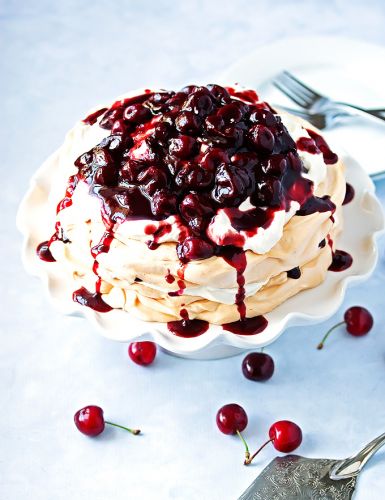 Pavlova with red wine cherry compote and mascarpone whipped cream