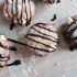 Peanut butter cream filled donuts with chocolate drizzle