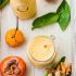 Persimmon and tangerine smoothie with vanilla, ginger and turmeric