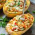 Cheesy pesto chicken and veggie stuffed spaghetti squash