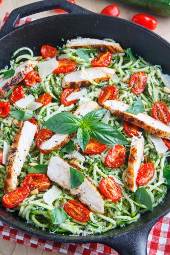 Pesto zucchini noodles with roasted tomatoes and grilled chicken