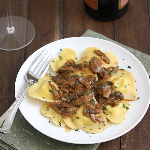 Four-cheese ravioli hearts with porcini mushroom sauce