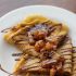 Pumpkin crepes with beer and cinnamon apples and a chocolate drizzle