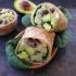 Black bean, feta and avocado quinoa wrap with avocado tahini dip
