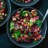 Colorful beet salad with carrot, quinoa and spinach