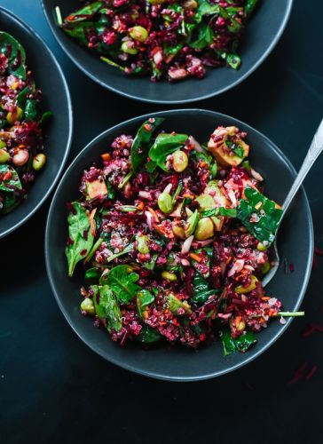 Colorful beet salad with carrot, quinoa and spinach