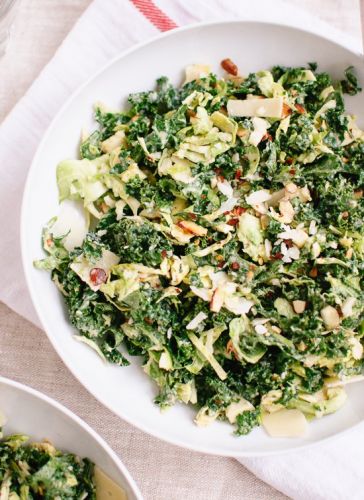 Raw Kale And Brussels Sprouts Salad With Tahini Maple Dressing