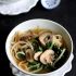 Rice noodle soup with mushrooms and kale