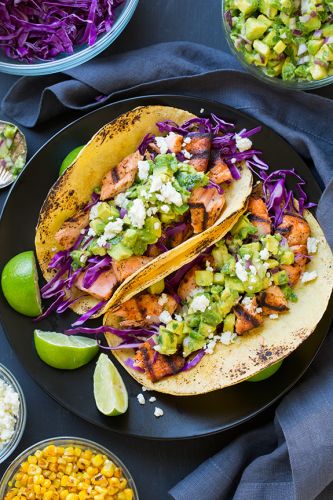 Grilled salmon tacos with avocado salsa