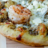 Shrimp and pesto pizza with goat cheese