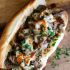 Sirloin Steak Tip Sandwich with Dubliner Cheese Sauce and Caramelized Onions