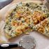63. Spinach and artichoke pizza