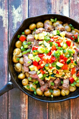 Steak and potato chimichurri with fresh summer vegetables