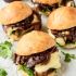 Mini steak sandwiches with Brie, caramelized onions and fig jam