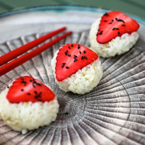 Strawberry sushi with chocolate sauce