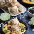 Tortilla chip crusted ravioli with spicy fontina queso fundido
