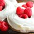 White chocolate covered baked raspberry donuts