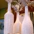 Recycle empty wine bottles for a White Christmas display