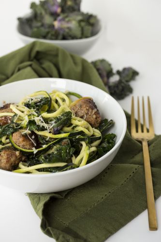 Spicy Parmesan-garlic zucchini pasta with sausage and kalettes