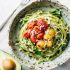 Burst tomato and zucchini spaghetti with avocado sauce