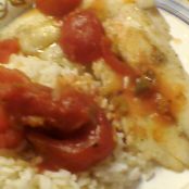 Tilaphia with rice and tomatoes