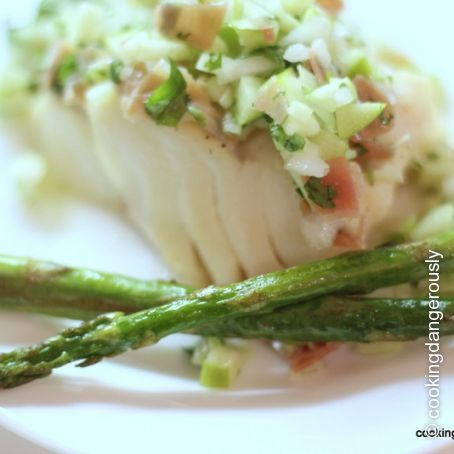 Green apple and prosciutto salsa over cod