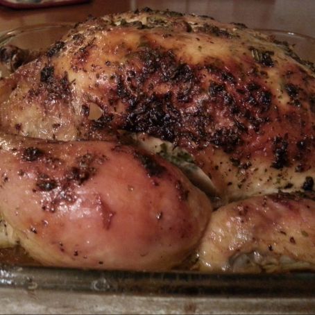 Roasted Chicken stuffed with Garlic, Rosemary and Lemon